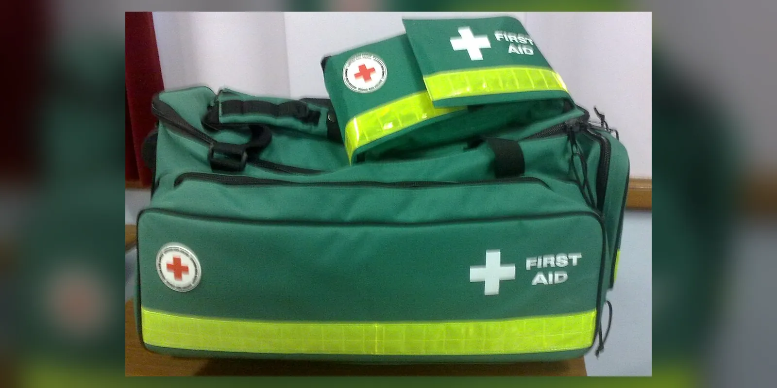 A large first wheeled first aid kit, and small first aid personal bag used by the British Red Cross for event first aid duties.